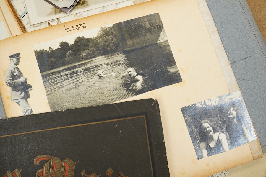 An archive of post First World War documents and photographs including two part letters signed by Winston Churchill